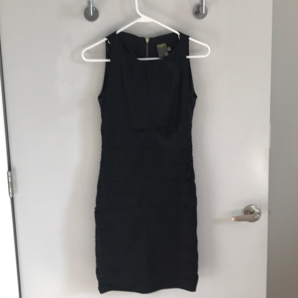 Black satiny sleeveless dress with ruching detail